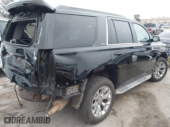 2015 GMC Yukon SLT with VIN 1GKS1BKC3FR129173, listed as a IAAI auction lot 41795585 with 97,893 mi miles. Bid and sale history available at carsss.com. Image 4.