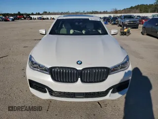 2019 BMW 7 Series 750i with VIN WBA7F0C5XKGM25897, listed as a Copart auction lot 86758004 with 68,700 mi miles and Salvage title. Bid and sale history available at DreamBid. Image 5.
