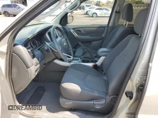 2005 Mazda Tribute i with VIN 4F2YZ02Z65KM01780, listed as a Copart auction lot 70890314 with 119,107 mi miles and Salvage Title. Bid and sale history available at carsss.com. Image 7.