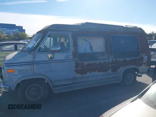 1989 GMC Vandura z VIN 1GDEG25K1K7521984, wystawiony jako IAAI lot #41371811 z przebiegiem 43 502 mil mil oraz . Historia ofert i sprzedaży dostępna na DreamBid. Obrazek 13.