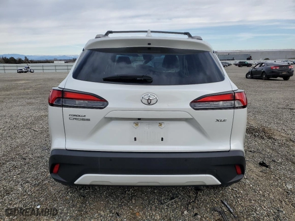 2022 Toyota Corolla Cross XLE with VIN 7MUDAAAG2NV030269, listed as a Copart auction lot 44768265 with NaN miles and Salvage Title. Bid and sale history available at carsss.com. Image 6.