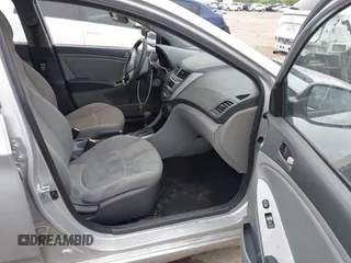 2015 Hyundai Accent GLS with VIN KMHCT4AE5FU883113, listed as a IAAI auction lot 41899701 with 123,023 mi miles and . Bid and sale history available at carsss.com. Image 5.