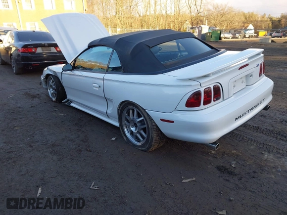 1996 Ford Mustang GT with VIN 1FALP45X7TF201553, listed as a IAAI auction lot 41487690 with 102,015 mi miles. Bid and sale history available at carsss.com. Image 3.