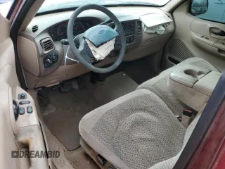 1999 Ford F-150 with VIN 1FTRF17W1XKB48291, listed as a Copart auction lot 45526035 with 154,699 mi miles and Salvage title. Bid and sale history available at DreamBid. Image 8.
