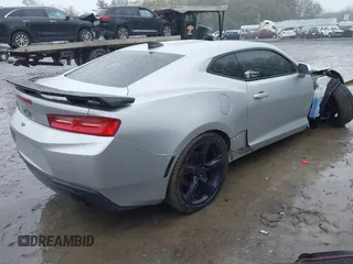 2017 Chevrolet Camaro 1LT z VIN 1G1FB1RXXH0179842, wystawiony jako IAAI lot #42192280 z przebiegiem 89 548 mil mil oraz . Historia ofert i sprzedaży dostępna na DreamBid. Obrazek 4.
