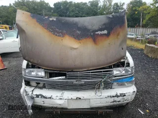 2001 Chevrolet Astro with VIN 1GNDM19W41B133828, listed as a Copart auction lot 71956404 with Not Provided miles and Salvage Title. Bid and sale history available at carsss.com. Image 5.