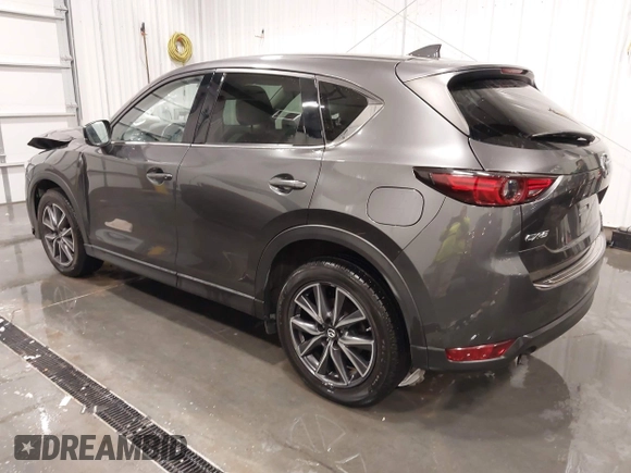 2017 Mazda CX-5 Grand Touring with VIN JM3KFADLXH0151593, listed as a IAAI auction lot 41823378 with 149,299 mi miles. Bid and sale history available at carsss.com. Image 3.