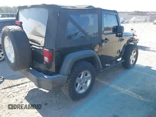 2012 Jeep Wrangler Sport with VIN 1C4AJWAG0CL247103, listed as a IAAI auction lot 42181637 with 159,003 mi miles and . Bid and sale history available at DreamBid. Image 4.