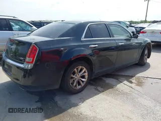2014 Chrysler 300 with VIN 2C3CCAEG6EH372871, listed as a IAAI auction lot 41896128 with 137,240 mi miles. Bid and sale history available at carsss.com. Image 4.