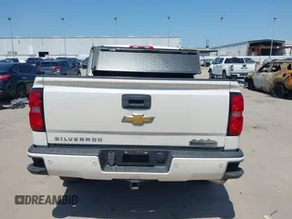 2014 Chevrolet Silverado 1500 High Country with VIN 3GCUKTEC4EG409072, listed as a IAAI auction lot 41986843 with 124,058 mi miles. Bid and sale history available at carsss.com. Image 17.
