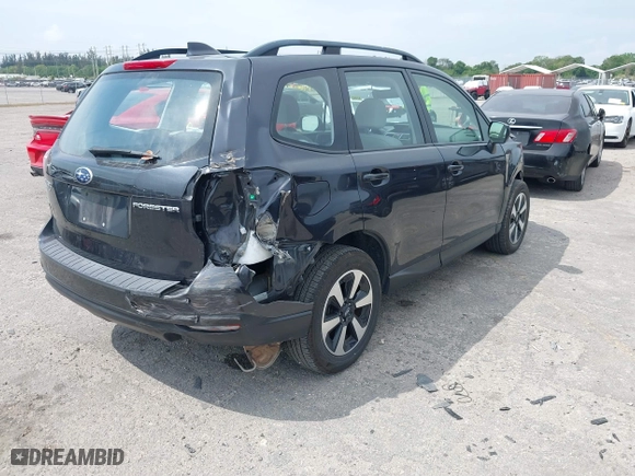 2018 Subaru Forester with VIN JF2SJABC3JH477514, listed as a IAAI auction lot 41880639 with 134,970 mi miles. Bid and sale history available at carsss.com. Image 4.