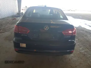 2013 Volkswagen Jetta Hybrid SE z VIN 3VW637AJ3DM303596, wystawiony jako Copart lot #82874934 z przebiegiem 56 601 mil mil oraz Szkoda całkowita • Salvage title. Historia ofert i sprzedaży dostępna na DreamBid. Obrazek 6.