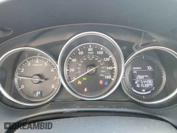 2014 Mazda CX-5 Touring z VIN JM3KE2CY0E0412733, wystawiony jako Copart lot #55803865 z przebiegiem 161 539 mil mil oraz Szkoda całkowita • Salvage title. Historia ofert i sprzedaży dostępna na DreamBid. Obrazek 9.