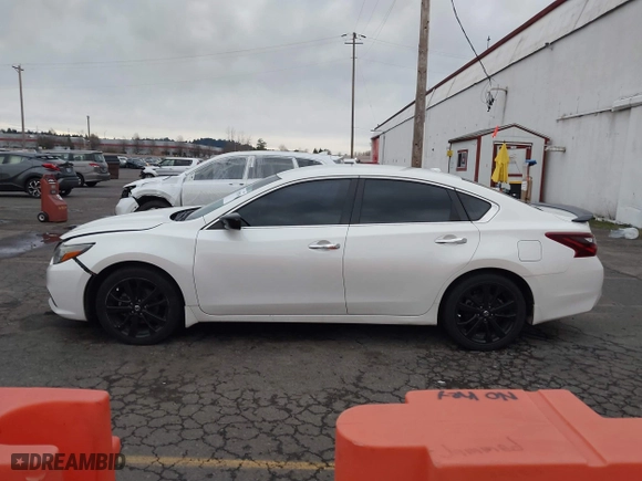 2018 Nissan Altima 2.5 SV with VIN 1N4AL3AP4JC158095, listed as a IAAI auction lot 41155838 with 79,504 mi miles. Bid and sale history available at carsss.com. Image 14.