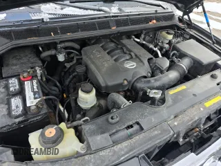 2005 Nissan Titan LE with VIN 1N6AA07B85N550031, listed as a Copart auction lot 43530985 with 165,496 mi miles and Clean Title. Bid and sale history available at carsss.com. Image 7.