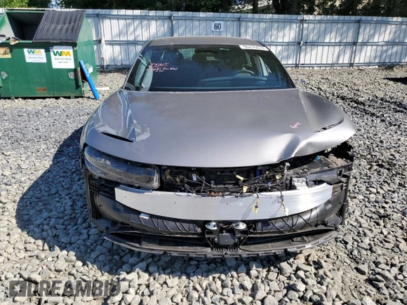 2023 Lucid Air Pure z VIN 50EA1PFA7PA006470, wystawiony jako Copart lot #56476674 z przebiegiem 18 246 mil mil oraz Szkody całkowita. Historia ofert i sprzedaży dostępna na DreamBid. Obrazek 5.