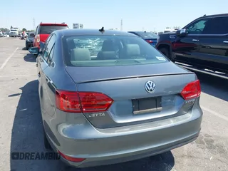 2013 Volkswagen Jetta Hybrid SE with VIN 3VW637AJ1DM232687, listed as a IAAI auction lot 41973407 with 70,428 mi miles and . Bid and sale history available at DreamBid. Image 3.