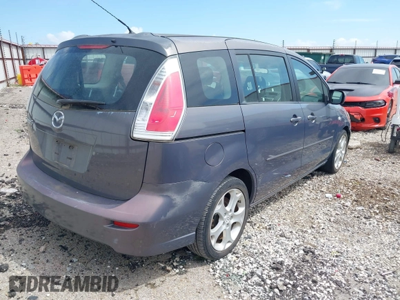 2009 Mazda 5 Touring with VIN JM1CR29LX90333914, listed as a IAAI auction lot 42101304 with 129,470 mi miles. Bid and sale history available at carsss.com. Image 4.
