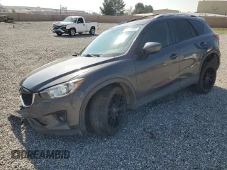 2014 Mazda CX-5 Touring with VIN JM3KE4CY6E0375084, listed as a Copart auction lot 46344065 with 143,828 mi miles and Salvage Title. Bid and sale history available at carsss.com. Image 1.