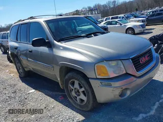 2003 GMC Envoy SLT with VIN 1GKDT13S932408845, listed as a IAAI auction lot 41594498 with 209,774 mi miles. Bid and sale history available at carsss.com. Image 1.