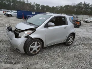 2012 Scion iQ with VIN JTNJJXB0XCJ013498, listed as a Copart auction lot 45994605 with 104,182 mi miles and Salvage Title. Bid and sale history available at carsss.com. Image 1.