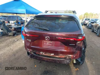 2024 Mazda CX-90 S Premium z VIN JM3KKDHC2R1101502, wystawiony jako IAAI lot #42114075 z przebiegiem 16 288 mil mil oraz . Historia ofert i sprzedaży dostępna na DreamBid. Obrazek 16.