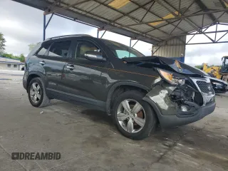 2012 Kia Sorento EX с VIN 5XYKU4A64CG261606, выставлен на аукционе Copart как лот 60863835 с пробегом 196 380 миль миль и Списание • Salvage title. История ставок и продаж доступна на DreamBid. Изображение 4.