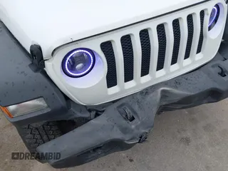 2018 Jeep Wrangler Unlimited Sport S z VIN 1C4HJXDG6JW222637, wystawiony jako IAAI lot #42333283 z przebiegiem 80 595 mil mil oraz . Historia ofert i sprzedaży dostępna na DreamBid. Obrazek 6.