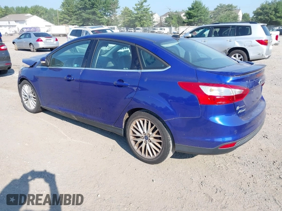 2014 Ford Focus Titanium with VIN 1FADP3J26EL179266, listed as a IAAI auction lot 42712701 with 157,897 mi miles and . Bid and sale history available at DreamBid. Image 3.