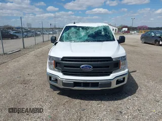 2020 Ford F-150 XL with VIN 1FTMF1CP3LKE03557, listed as a IAAI auction lot 42017506 with 22,442 mi miles and . Bid and sale history available at DreamBid. Image 13.