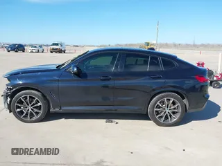 2021 BMW X4 xDrive30i z VIN 5UX2V1C06M9E42747, wystawiony jako IAAI lot #41661458 z przebiegiem 66 292 mil mil oraz . Historia ofert i sprzedaży dostępna na DreamBid. Obrazek 15.