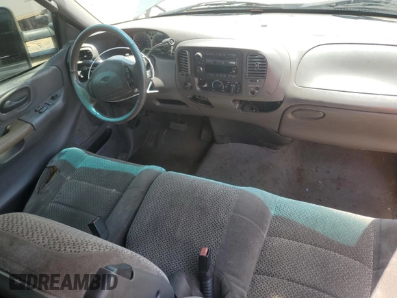 2002 Ford F-150 XL z VIN 1FTRX18L52NB59531, wystawiony jako Copart lot #58550365 z przebiegiem 267 424 mil mil oraz Szkoda całkowita • Salvage title. Historia ofert i sprzedaży dostępna na DreamBid. Obrazek 8.