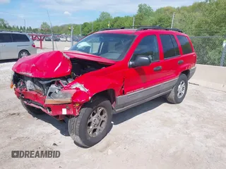 1999 Jeep Grand Cherokee Laredo with VIN 1J4GW58S7XC746609, listed as a IAAI auction lot 42260018 with 254,352 mi miles and . Bid and sale history available at DreamBid. Image 2.