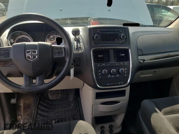 2014 Dodge Grand Caravan American Value with VIN 2C4RDGBGXER413961, listed as a Copart auction lot 54748405 with 146,589 mi miles and Clean Title. Bid and sale history available at DreamBid. Image 9.