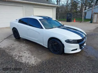 2016 Dodge Charger SXT with VIN 2C3CDXJG0GH175381, listed as a IAAI auction lot 41985221 with 119,507 mi miles. Bid and sale history available at carsss.com. Image 1.