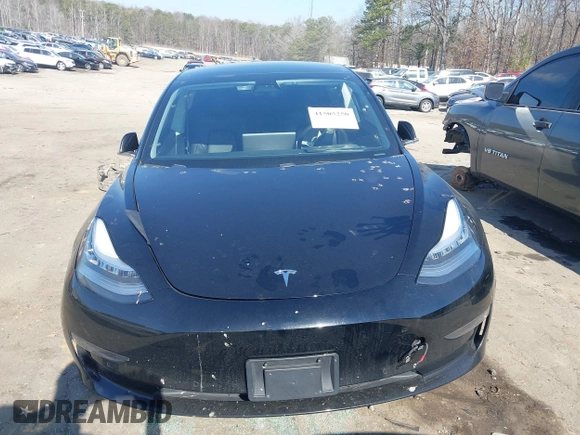2020 Tesla Model 3 Standard Range Plus with VIN 5YJ3E1EA0LF660759, listed as a IAAI auction lot 41505250 with 63,322 mi miles and . Bid and sale history available at DreamBid. Image 12.