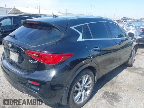 2018 Infiniti QX30 Premium with VIN SJKCH5CP9JA004522, listed as a IAAI auction lot 42277008 with 81,618 mi miles and . Bid and sale history available at DreamBid. Image 4.