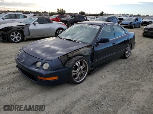 1998 Acura Integra LS with VIN JH4DB7653WS002571, listed as a Copart auction lot 73806394 with 258,143 mi miles and Salvage title. Bid and sale history available at DreamBid. Image 1.