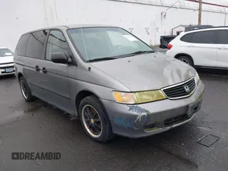 2000 Honda Odyssey LX z VIN 2HKRL1857YH570211, wystawiony jako IAAI lot #42139263 z przebiegiem 161 983 mil mil oraz . Historia ofert i sprzedaży dostępna na DreamBid. Obrazek 1.