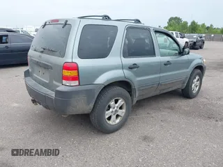 2005 Ford Escape XLT with VIN 1FMYU93165KA02357, listed as a IAAI auction lot 42858975 with 119,905 mi miles and . Bid and sale history available at DreamBid. Image 4.