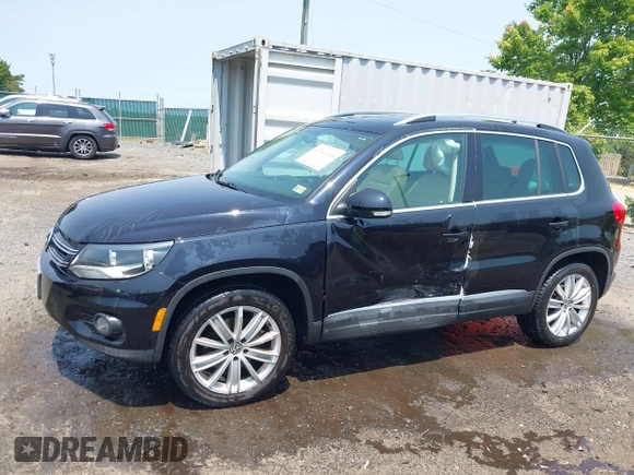 2012 Volkswagen Tiguan SE z VIN WVGBV7AX1CW548133, wystawiony jako IAAI lot #42403164 z przebiegiem 139 083 mil mil oraz . Historia ofert i sprzedaży dostępna na DreamBid. Obrazek 6.
