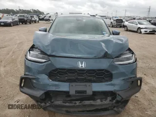 2023 Honda HR-V LX with VIN 3CZRZ1H34PM705094, listed as a Copart auction lot 55854825 with 26,607 mi miles and Salvage title. Bid and sale history available at DreamBid. Image 5.