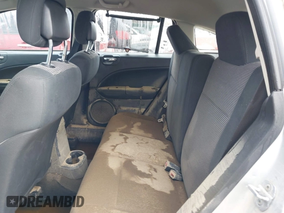 2011 Dodge Caliber Heat with VIN 1B3CB5HA0BD237473, listed as a IAAI auction lot 41690622 with 205,961 mi miles and . Bid and sale history available at DreamBid. Image 8.