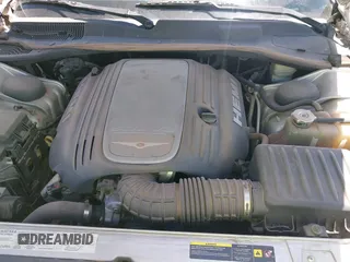 2006 Chrysler 300 C with VIN 2C3KA63H46H154990, listed as a IAAI auction lot 42004790 with 233,673 mi miles. Bid and sale history available at carsss.com. Image 10.