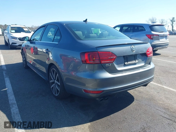 2014 Volkswagen Jetta GLI z VIN 3VW4T7AJ6EM360187, wystawiony jako IAAI lot #41932099 z przebiegiem 71 647 mil mil oraz . Historia ofert i sprzedaży dostępna na DreamBid. Obrazek 3.