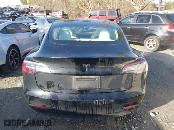 2019 Tesla Model 3 Mid Range z VIN 5YJ3E1EA4KF317872, wystawiony jako IAAI lot #41491269 z przebiegiem 90 772 mil mil oraz . Historia ofert i sprzedaży dostępna na DreamBid. Obrazek 15.