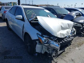 2015 Toyota Camry XLE with VIN 4T1BF1FK3FU913743, listed as a IAAI auction lot 42066972 with 136,917 mi miles and . Bid and sale history available at DreamBid. Image 1.