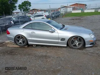 2003 Mercedes-Benz SL 500 z VIN WDBSK75F93F027609, wystawiony jako IAAI lot #42386934 z przebiegiem Nie podano mil oraz . Historia ofert i sprzedaży dostępna na DreamBid. Obrazek 12.