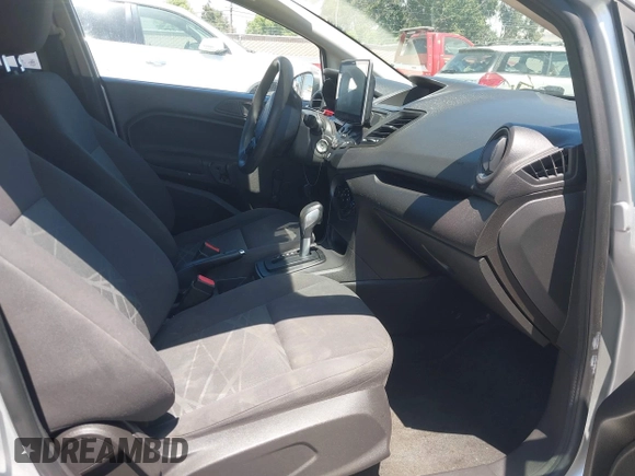 2014 Ford Fiesta S z VIN 3FADP4AJ0EM102338, wystawiony jako IAAI lot #42670979 z przebiegiem 141 301 mil mil oraz . Historia ofert i sprzedaży dostępna na DreamBid. Obrazek 5.