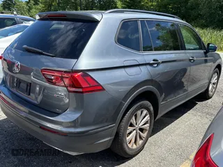 2018 Volkswagen Tiguan S z VIN 3VV0B7AX2JM014870, wystawiony jako Copart lot #65734835 z przebiegiem 118 575 mil mil oraz Czysty tytuł • Clean title. Historia ofert i sprzedaży dostępna na DreamBid. Obrazek 4.
